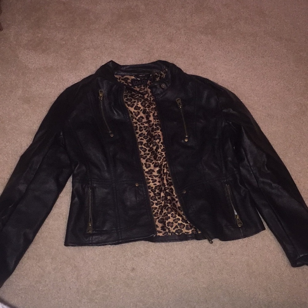 Black motor cycle/leather jacket
